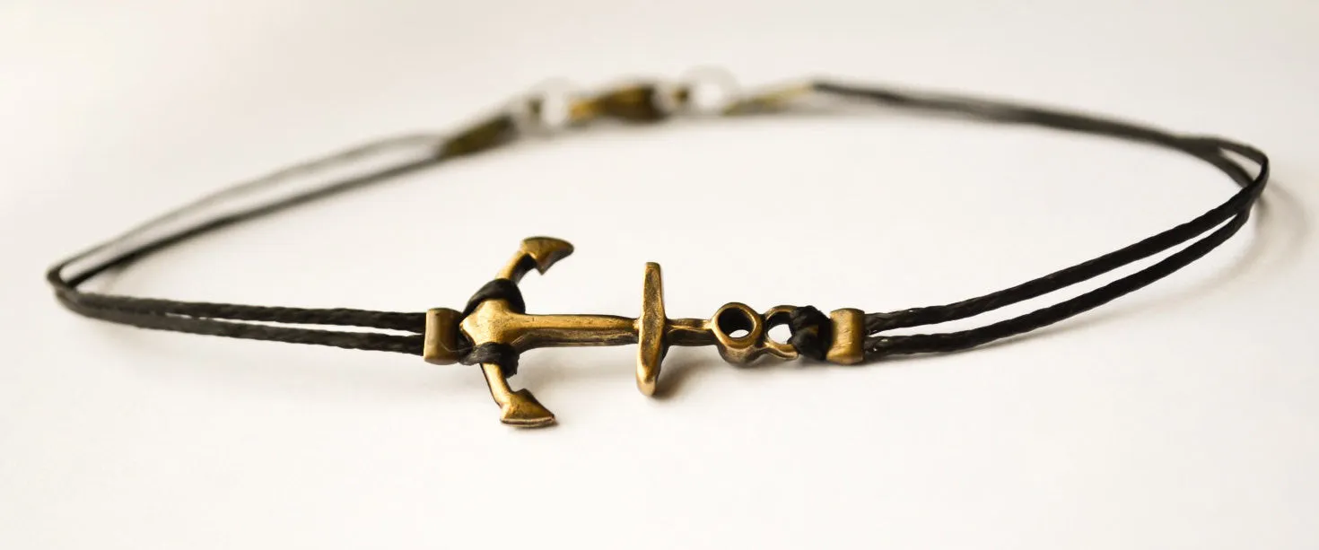 Bronze anchor bracelet for men with black cord, nautical surfer jewelry
